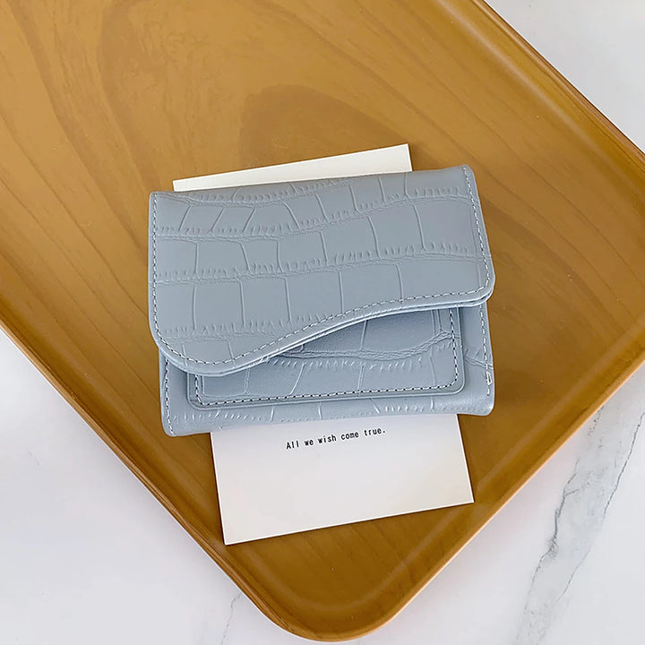 Alba croc-embossed vegan leather trifold wallet with curved flap