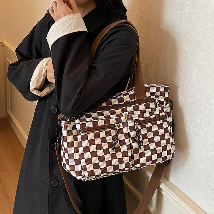 Kanna checkered corduroy shoulder bag with front zip pockets