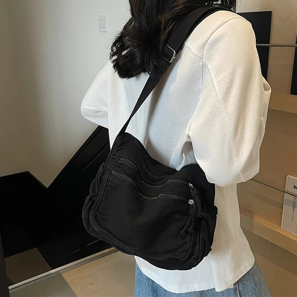 Rina washed canvas crossbody bag with front zip pockets