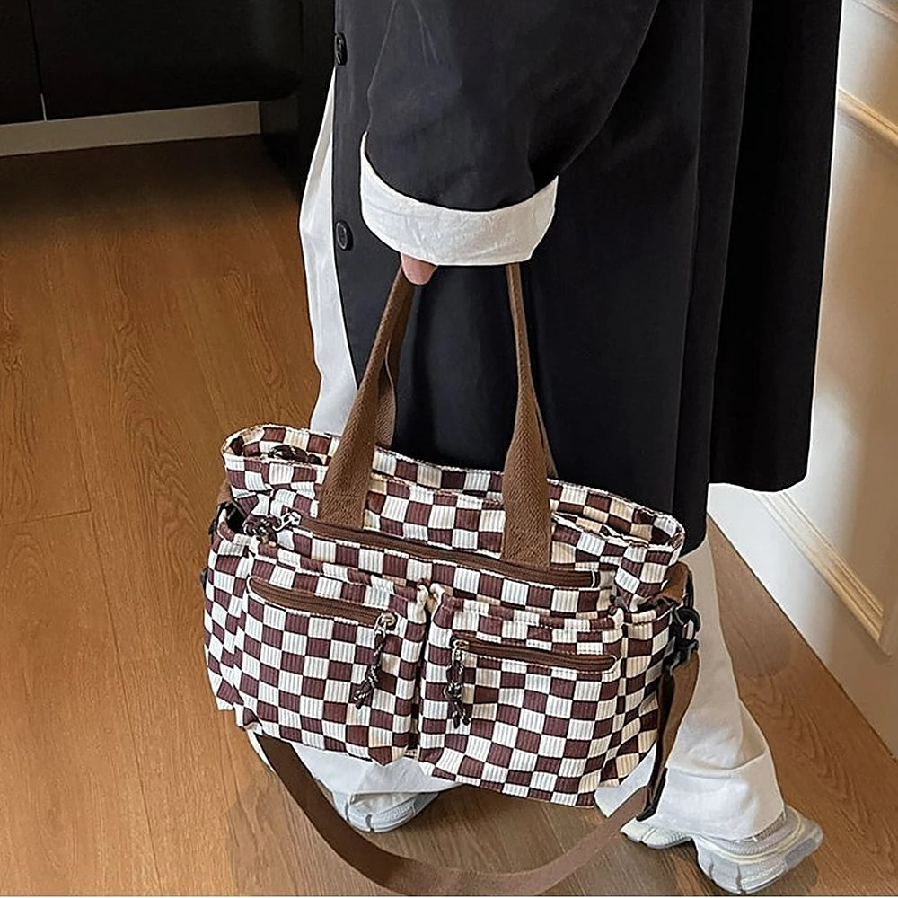Kanna checkered corduroy shoulder bag with front zip pockets