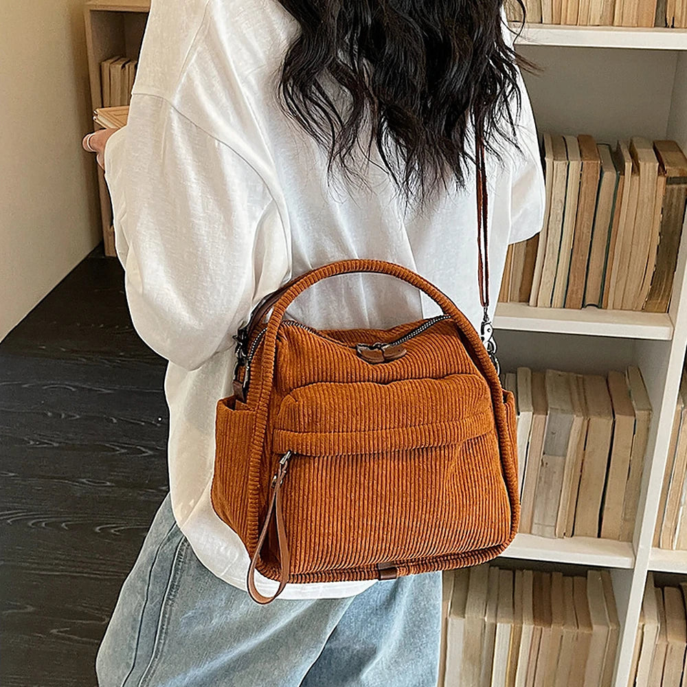 Lyona corduroy crossbody bag with front zip pocket