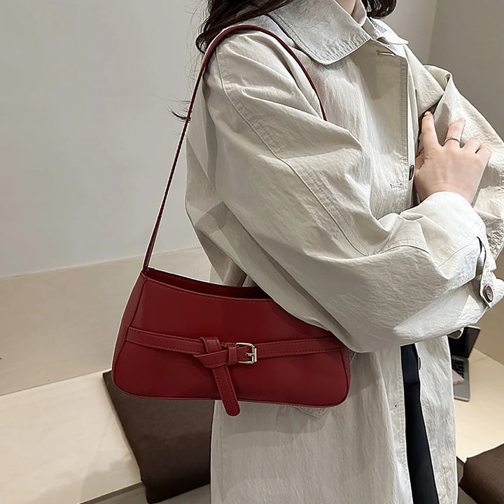 Isla vegan leather shoulder bag with knotted buckle strap
