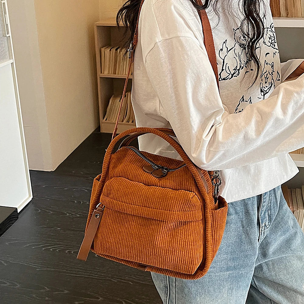 Lyona corduroy crossbody bag with front zip pocket