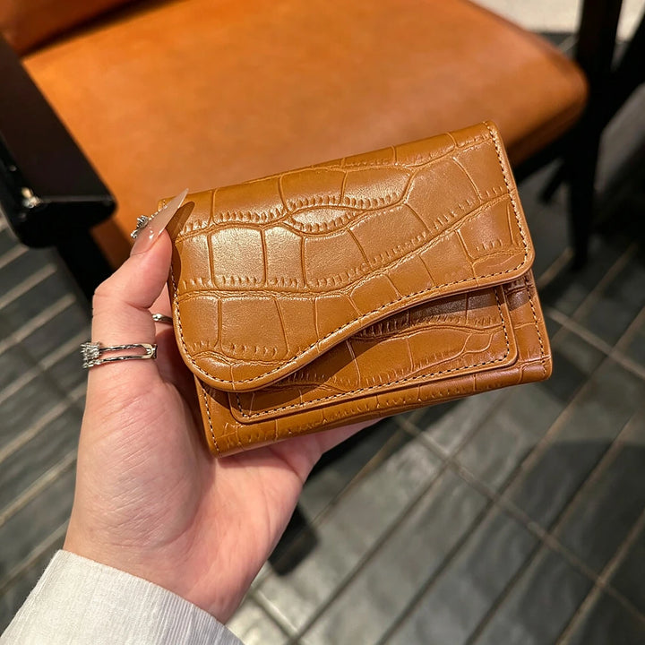 Alba croc-embossed vegan leather trifold wallet with curved flap
