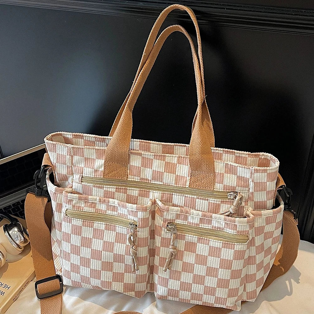 Kanna checkered corduroy shoulder bag with front zip pockets