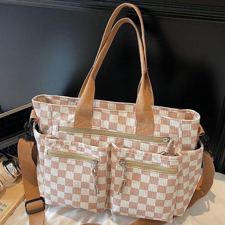 Kanna checkered corduroy shoulder bag with front zip pockets
