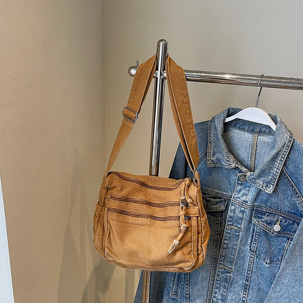 Rina washed canvas crossbody bag with front zip pockets