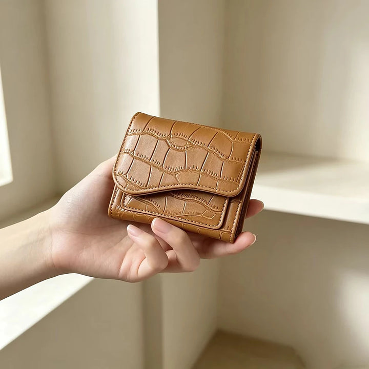 Alba croc-embossed vegan leather trifold wallet with curved flap