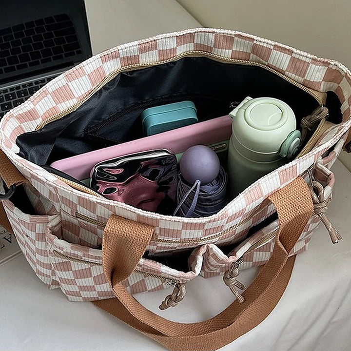 Kanna checkered corduroy shoulder bag with front zip pockets