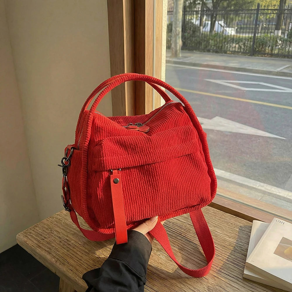 Lyona corduroy crossbody bag with front zip pocket