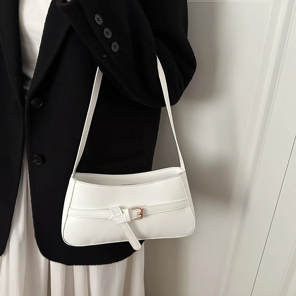 Isla vegan leather shoulder bag with knotted buckle strap