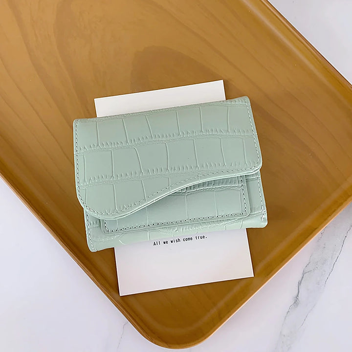 Alba croc-embossed vegan leather trifold wallet with curved flap