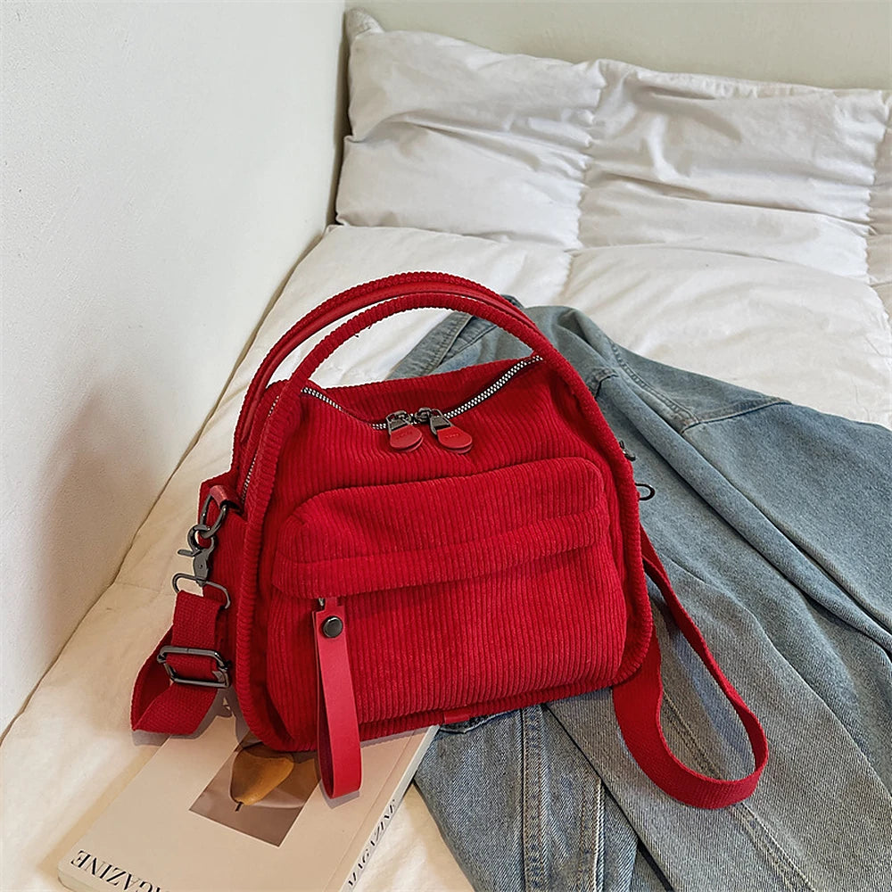 Lyona corduroy crossbody bag with front zip pocket