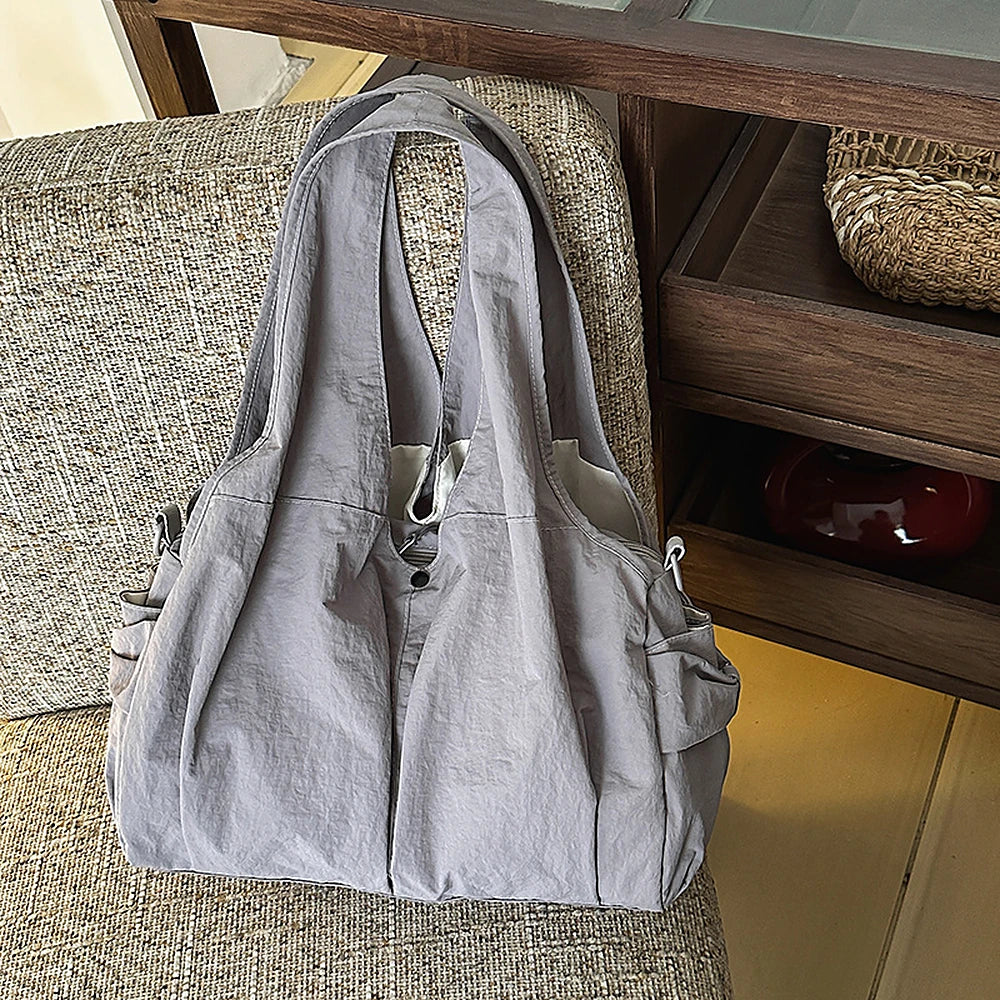 Noa crinkled nylon hobo bag with detachable crossbody strap