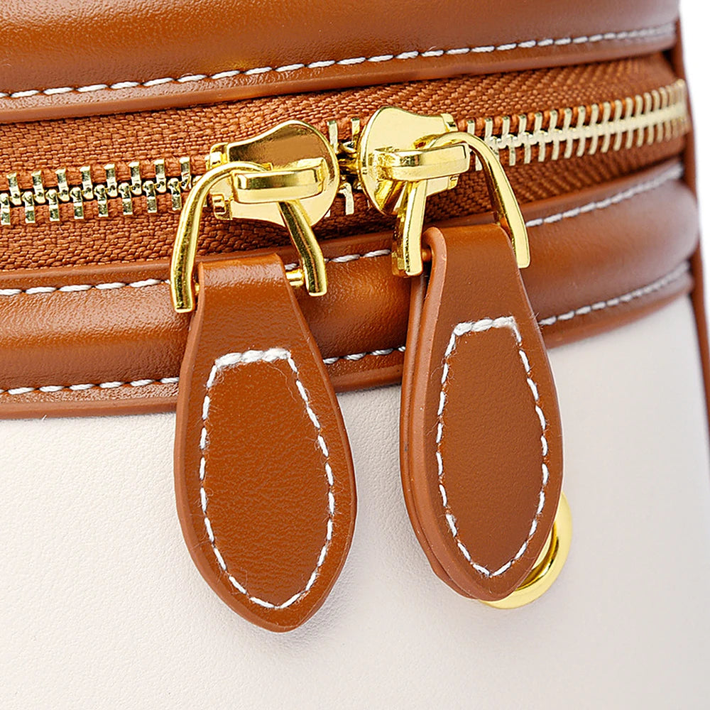 Romy vegan leather crossbody bucket bag with scarf-wrapped handle