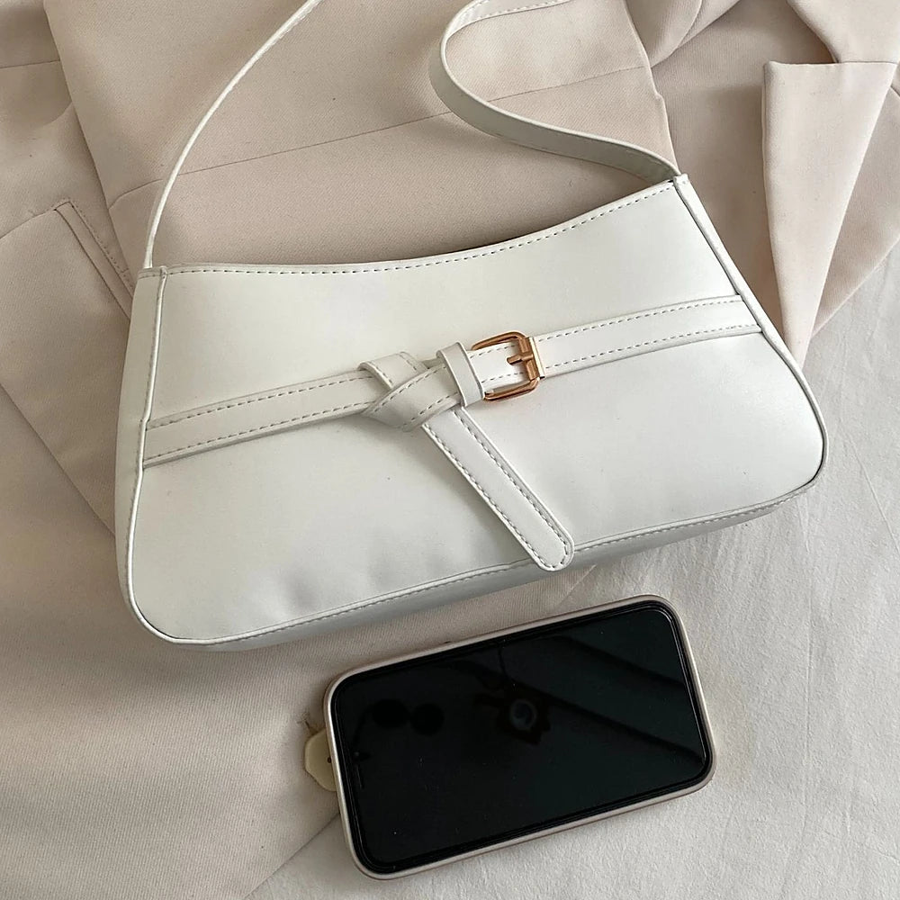 Isla vegan leather shoulder bag with knotted buckle strap