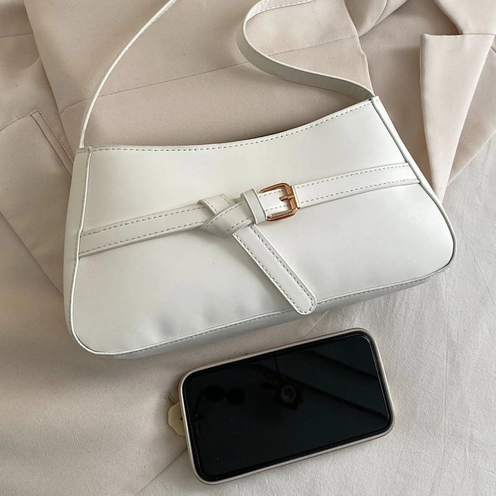 Isla vegan leather shoulder bag with knotted buckle strap