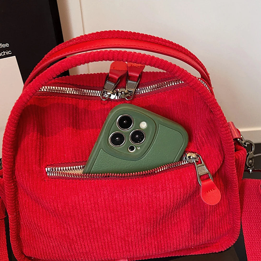 Lyona corduroy crossbody bag with front zip pocket