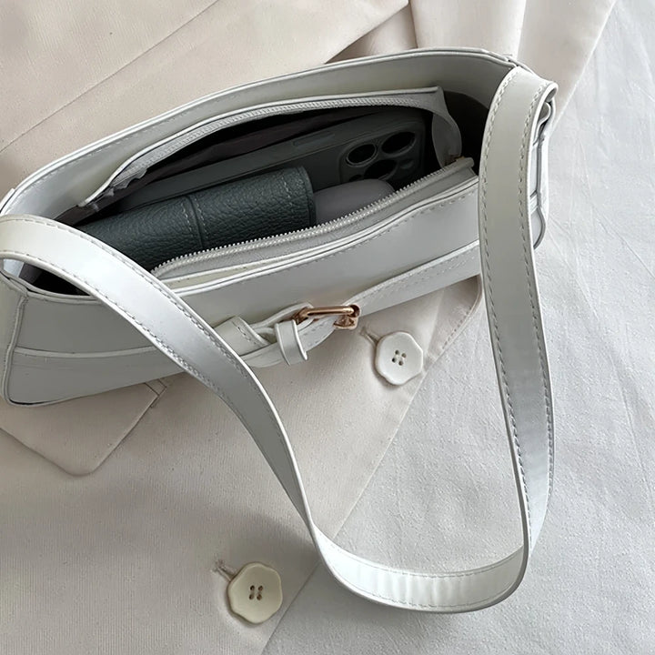 Isla vegan leather shoulder bag with knotted buckle strap