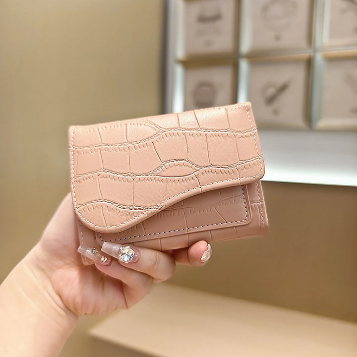 Alba croc-embossed vegan leather trifold wallet with curved flap
