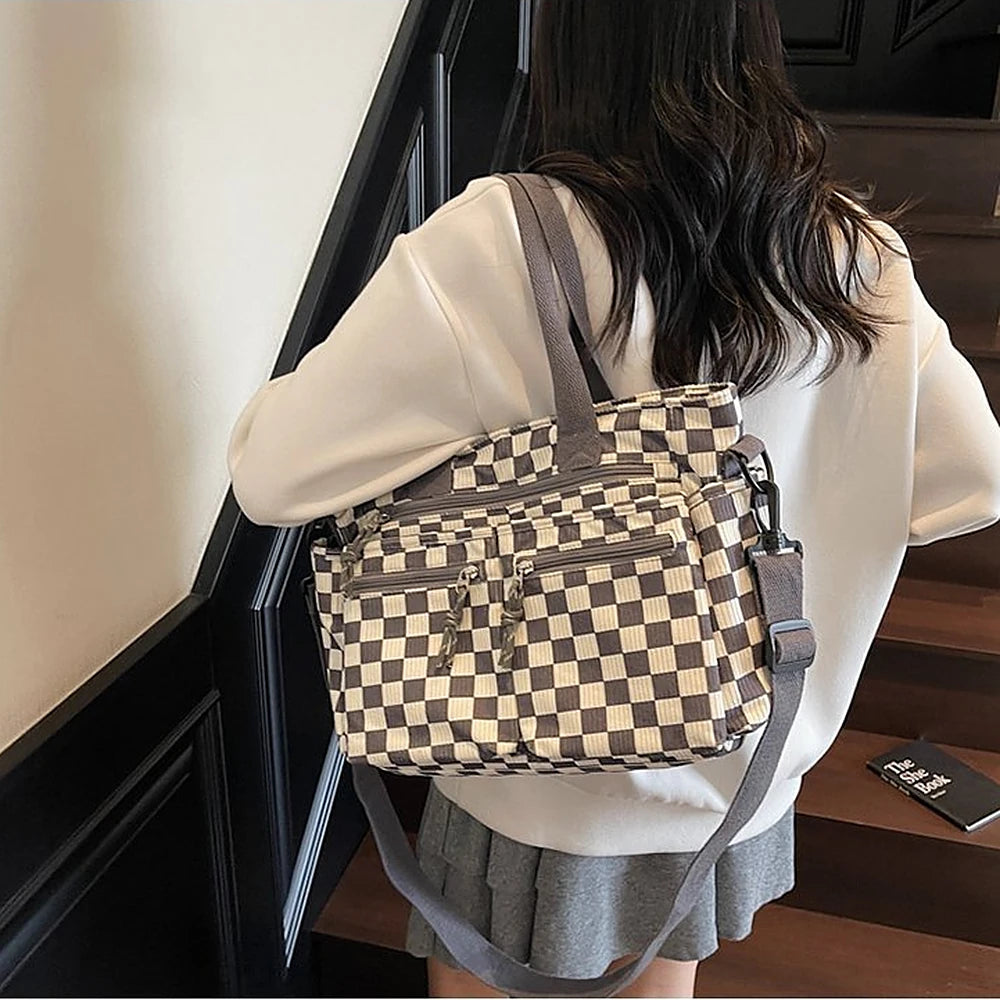 Kanna checkered corduroy shoulder bag with front zip pockets