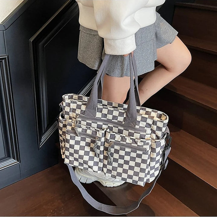 Kanna checkered corduroy shoulder bag with front zip pockets