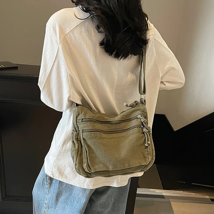Rina washed canvas crossbody bag with front zip pockets