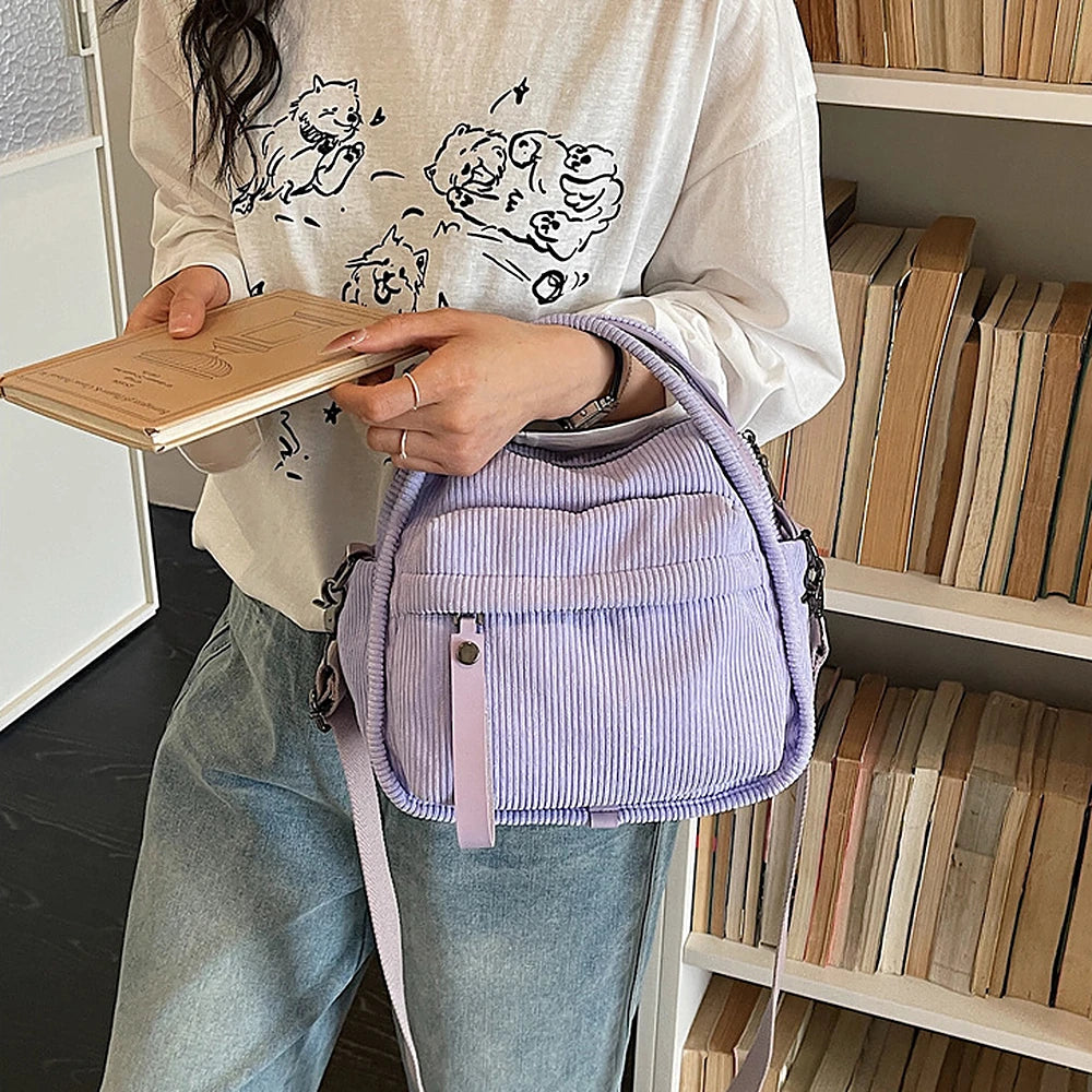 Lyona corduroy crossbody bag with front zip pocket