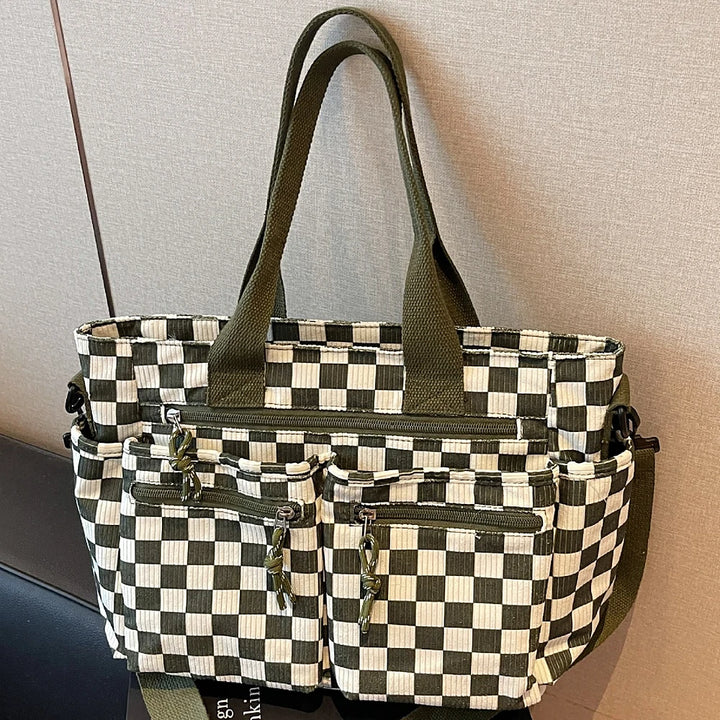Kanna checkered corduroy shoulder bag with front zip pockets