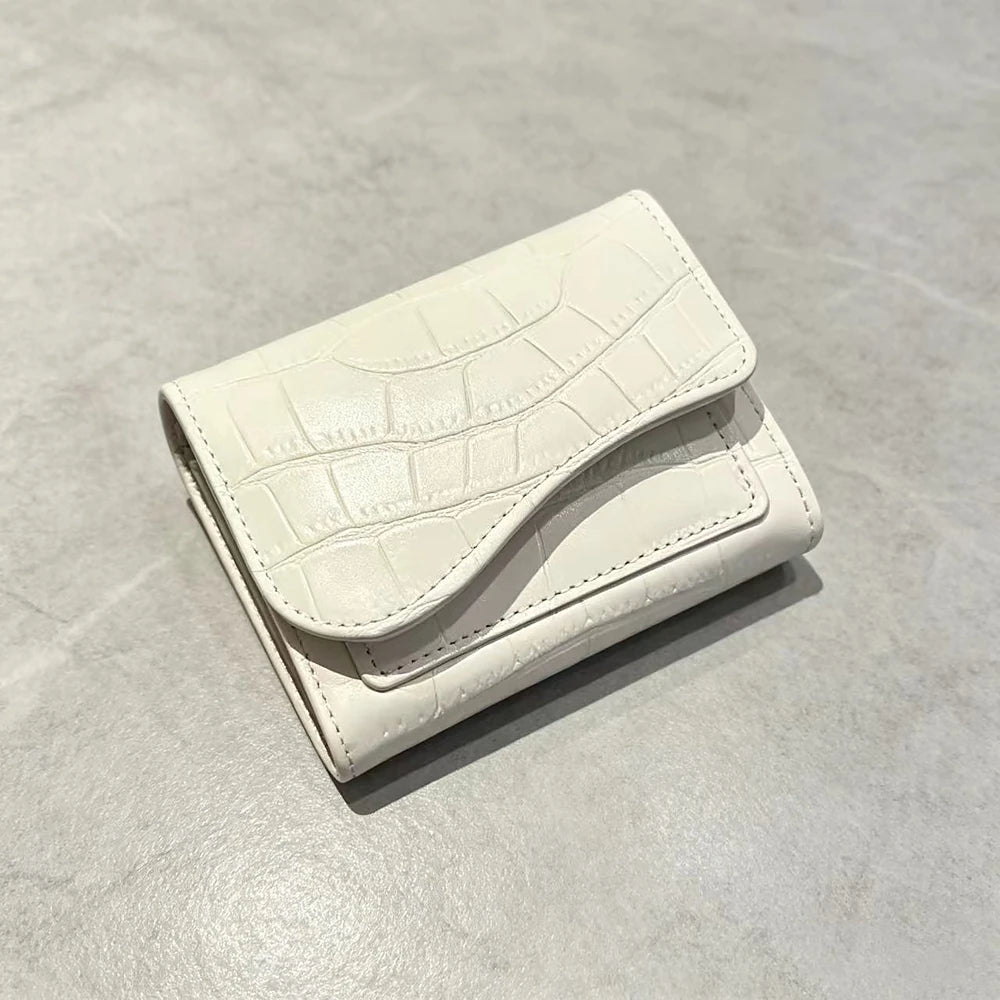 Alba croc-embossed vegan leather trifold wallet with curved flap