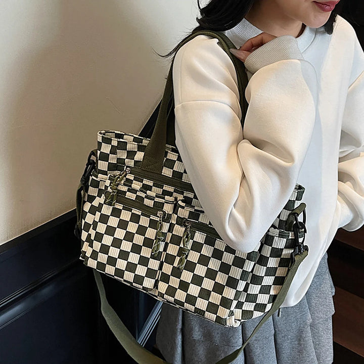 Kanna checkered corduroy shoulder bag with front zip pockets