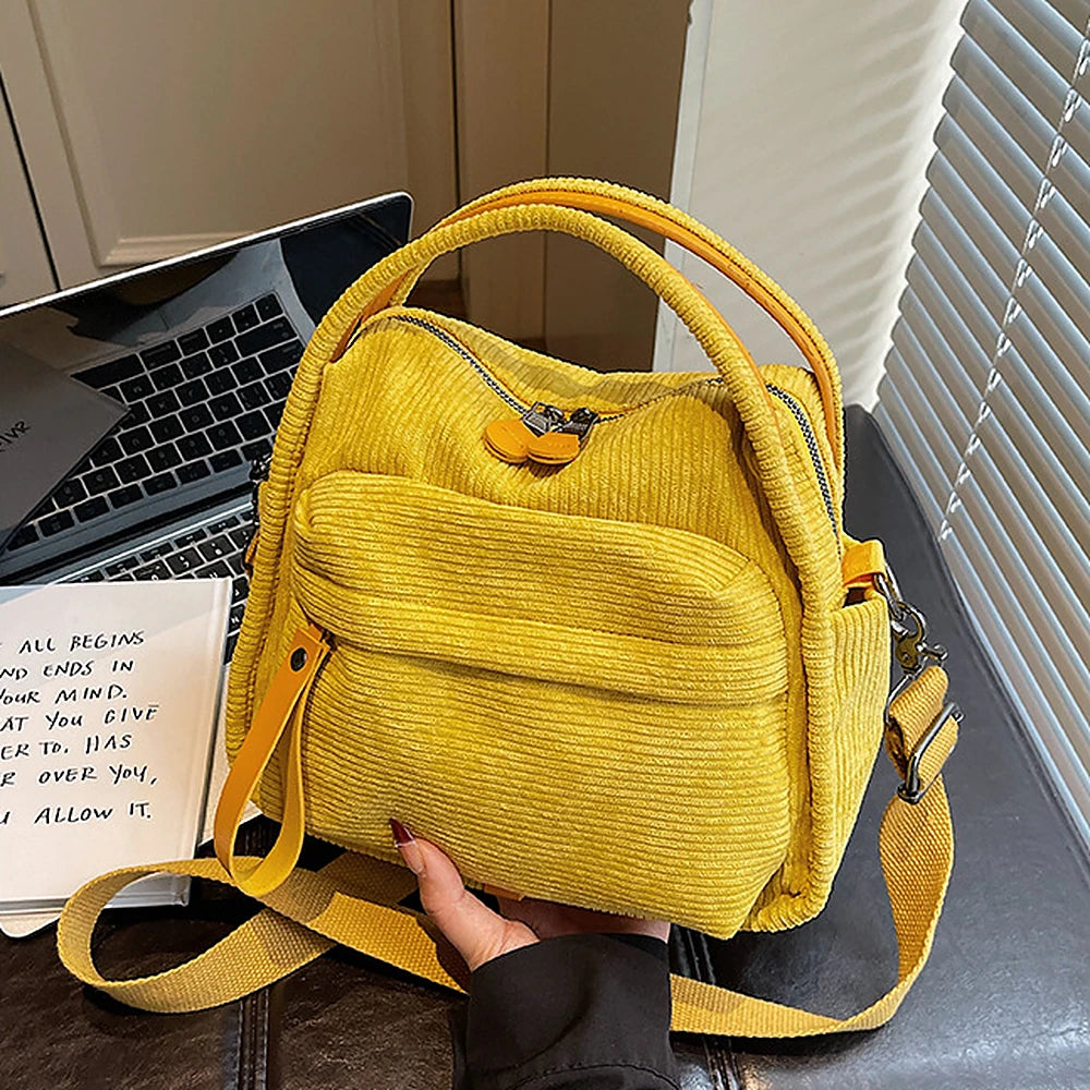 Lyona corduroy crossbody bag with front zip pocket