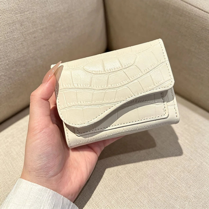 Alba croc-embossed vegan leather trifold wallet with curved flap