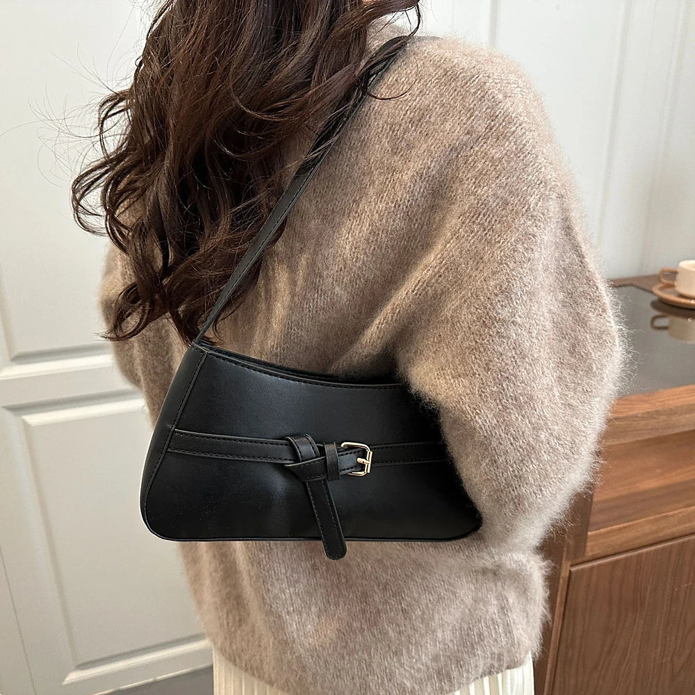 Isla vegan leather shoulder bag with knotted buckle strap