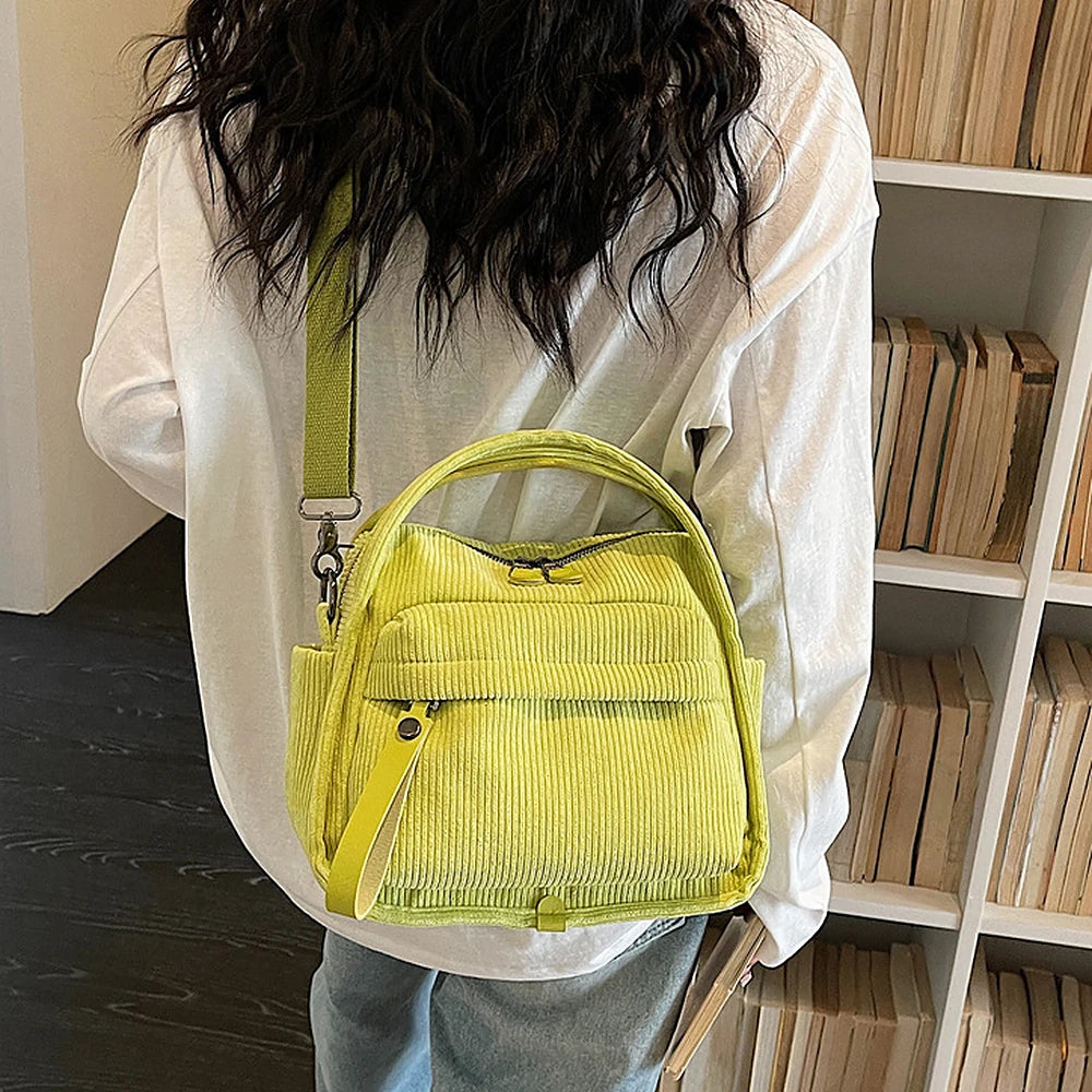Lyona corduroy crossbody bag with front zip pocket