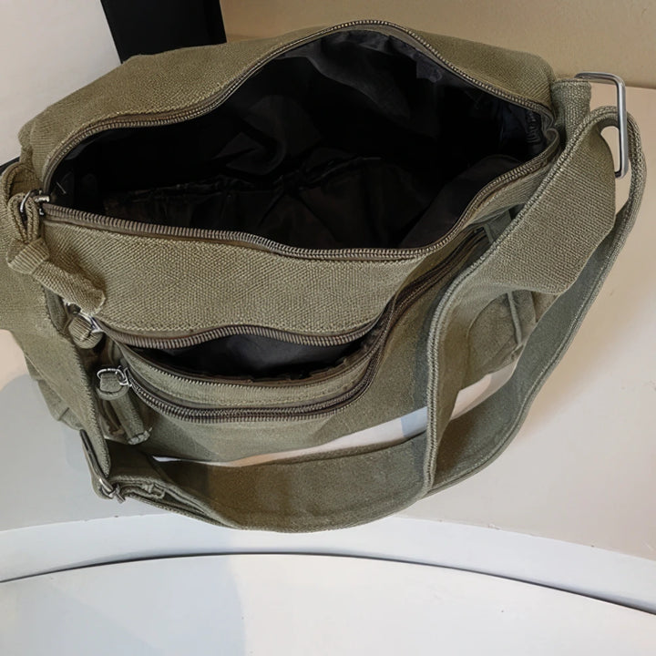 Rina washed canvas crossbody bag with front zip pockets