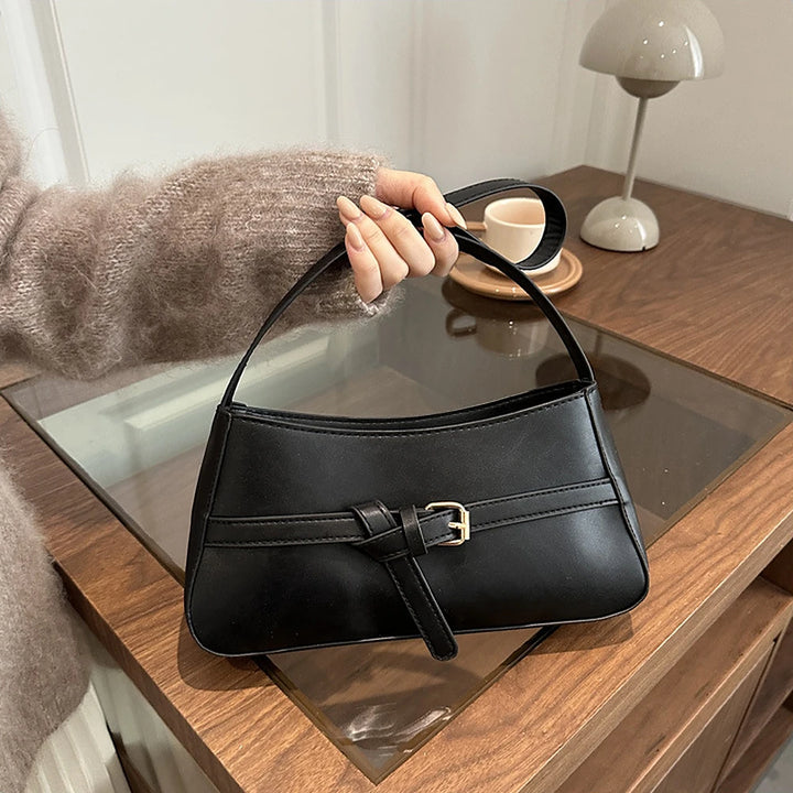 Isla vegan leather shoulder bag with knotted buckle strap
