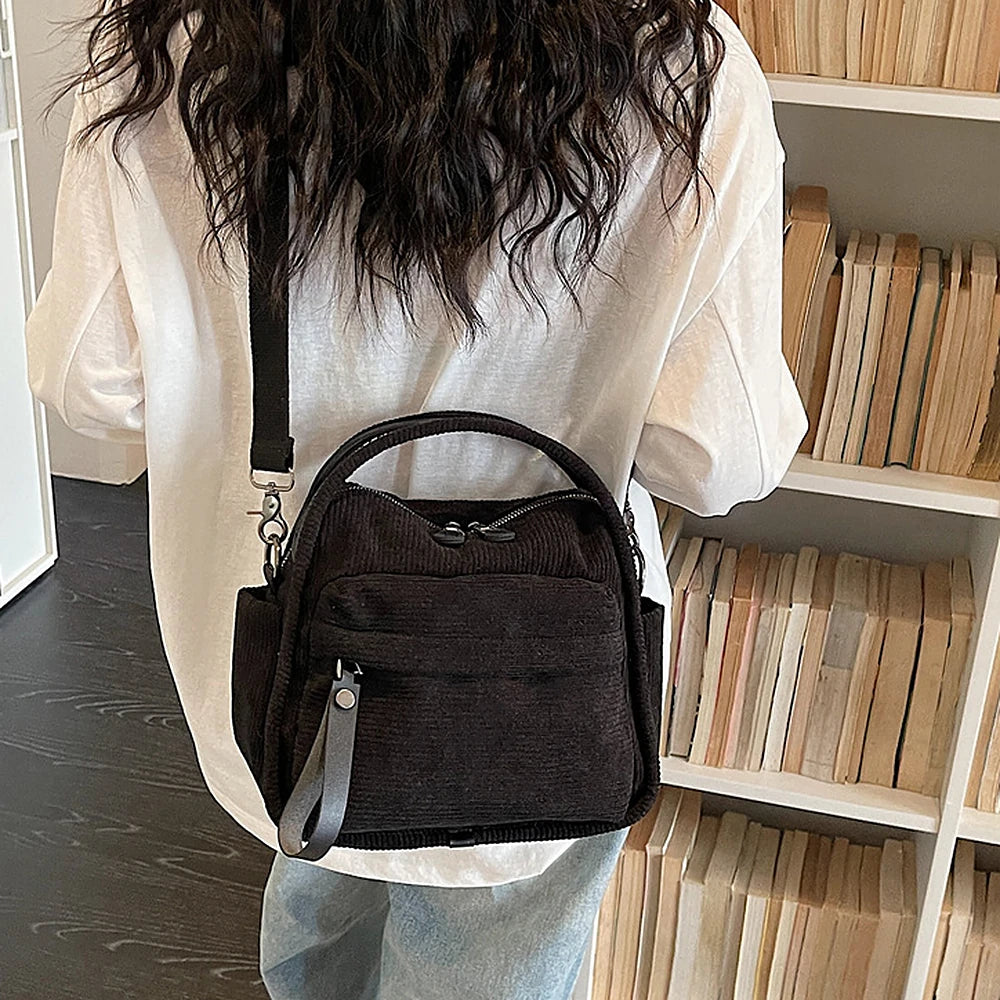 Lyona corduroy crossbody bag with front zip pocket