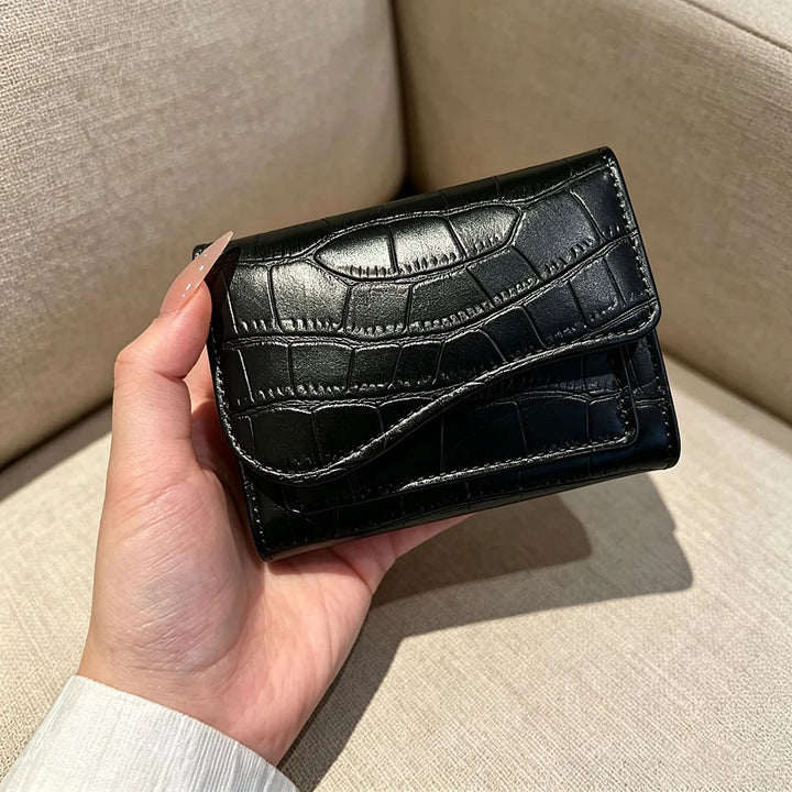 Alba croc-embossed vegan leather trifold wallet with curved flap