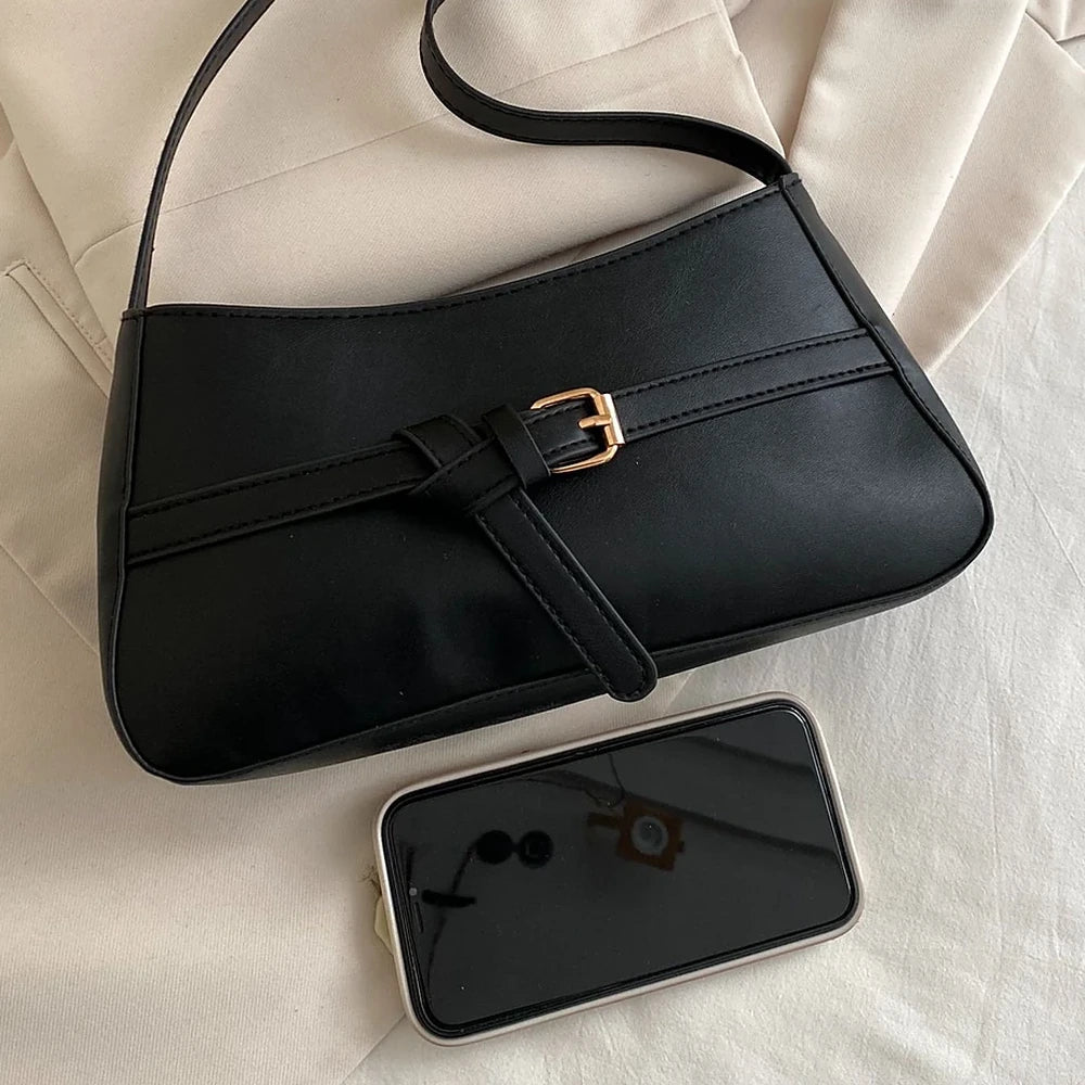 Isla vegan leather shoulder bag with knotted buckle strap