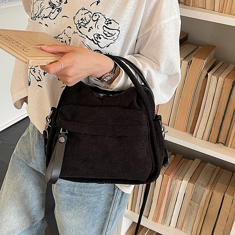 Lyona corduroy crossbody bag with front zip pocket