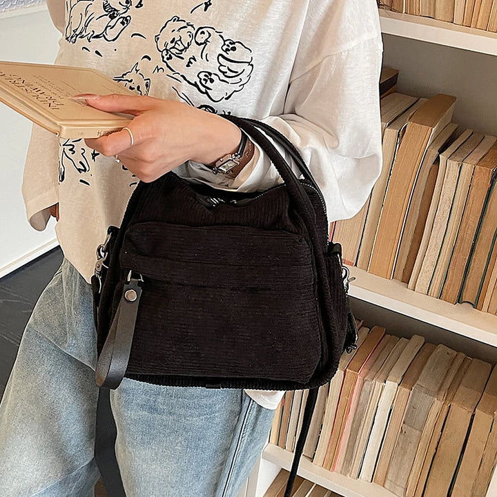 Lyona corduroy crossbody bag with front zip pocket
