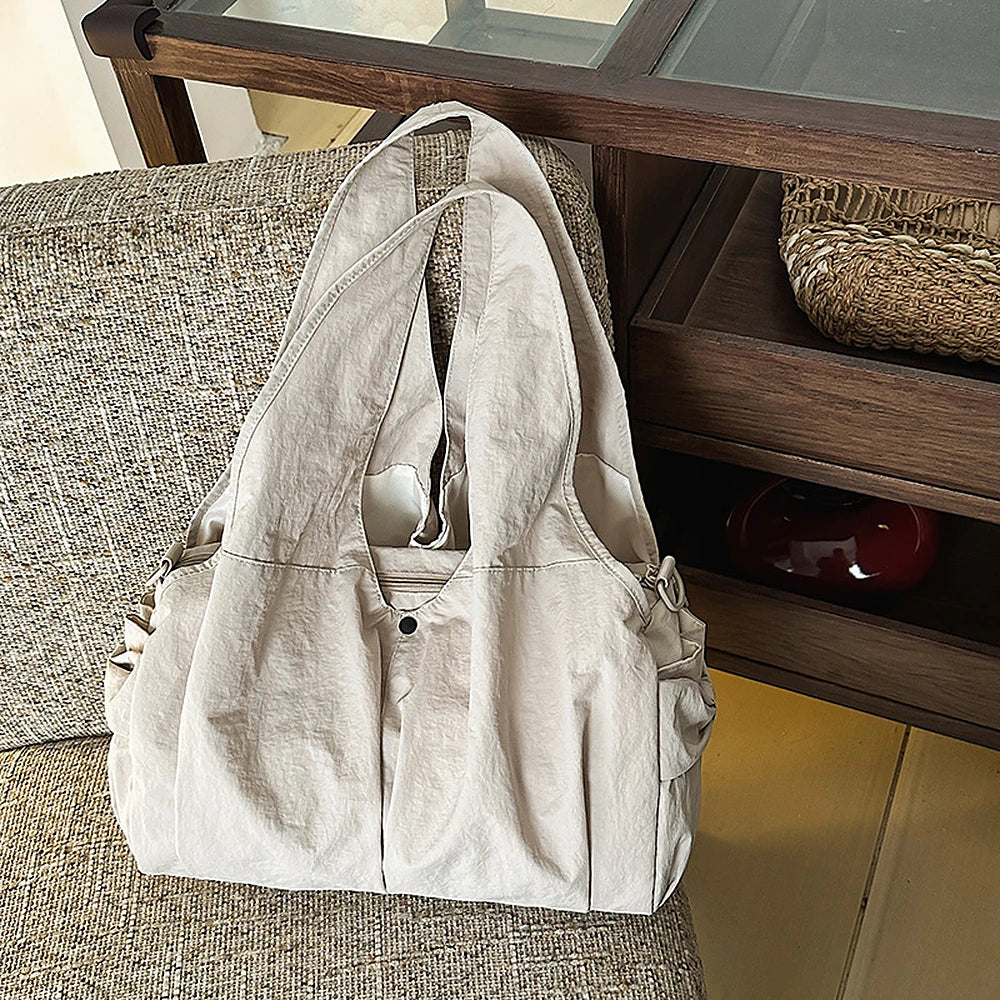 Noa crinkled nylon hobo bag with detachable crossbody strap