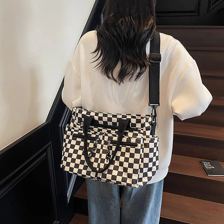 Kanna checkered corduroy shoulder bag with front zip pockets