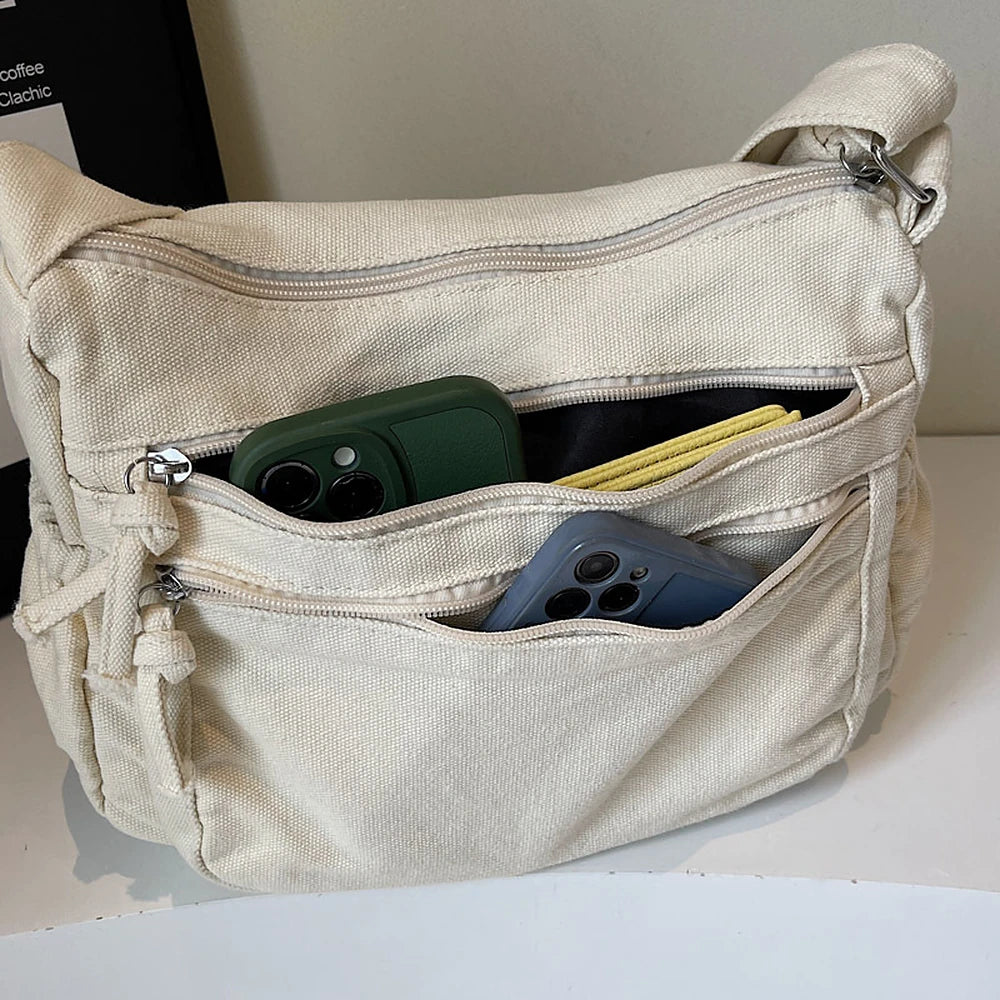 Rina washed canvas crossbody bag with front zip pockets