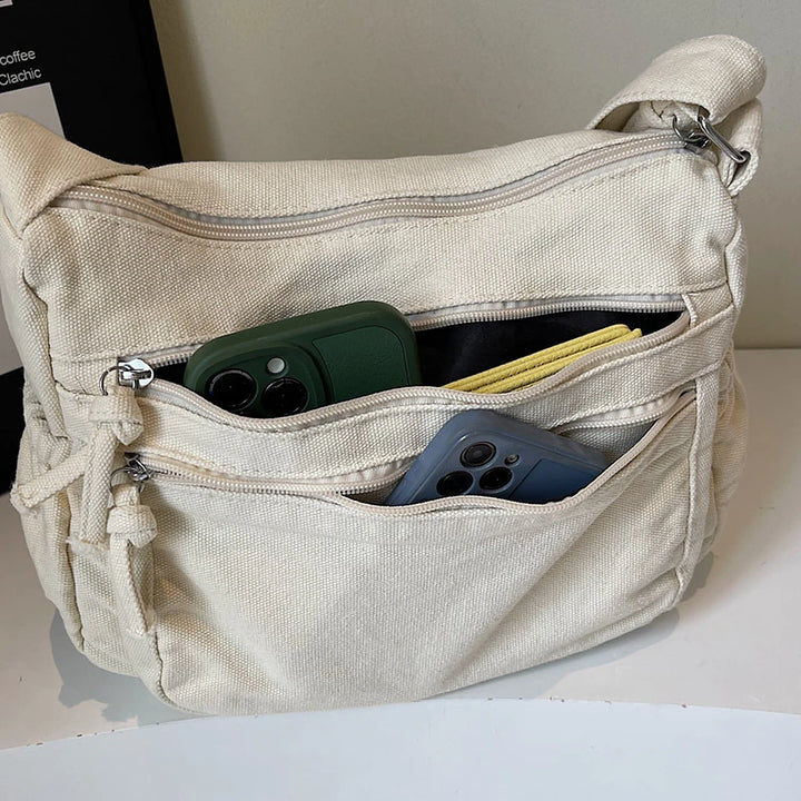 Rina washed canvas crossbody bag with front zip pockets