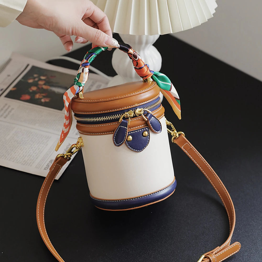 Romy vegan leather crossbody bucket bag with scarf-wrapped handle
