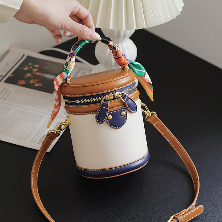 Romy vegan leather crossbody bucket bag with scarf-wrapped handle