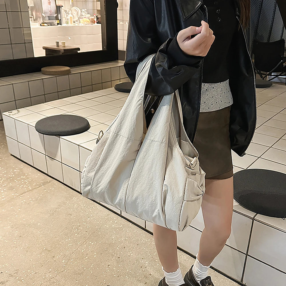 Noa crinkled nylon hobo bag with detachable crossbody strap