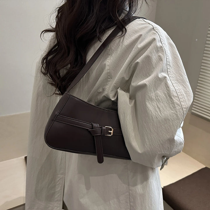 Isla vegan leather shoulder bag with knotted buckle strap